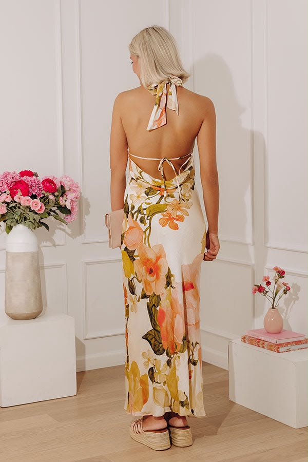 VESTIDO BEIGE FLORES NARANJA LARGO HALTER